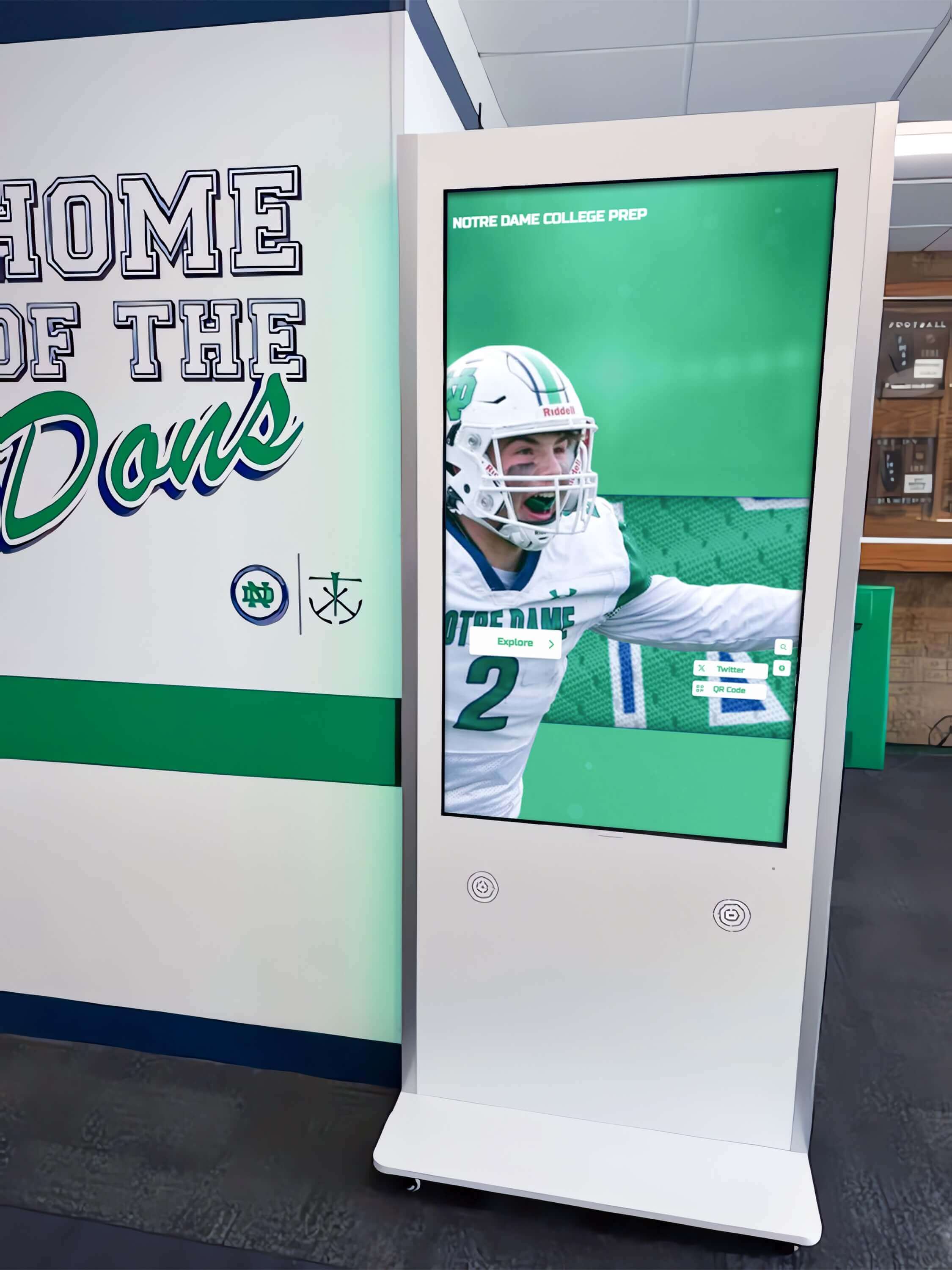 Freestanding interactive kiosk showcasing athletic achievements Interactive kiosk installation