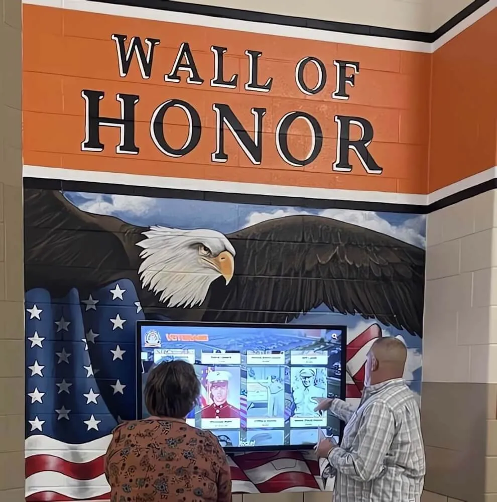 Military wall of honor with American flag and eagle emblem